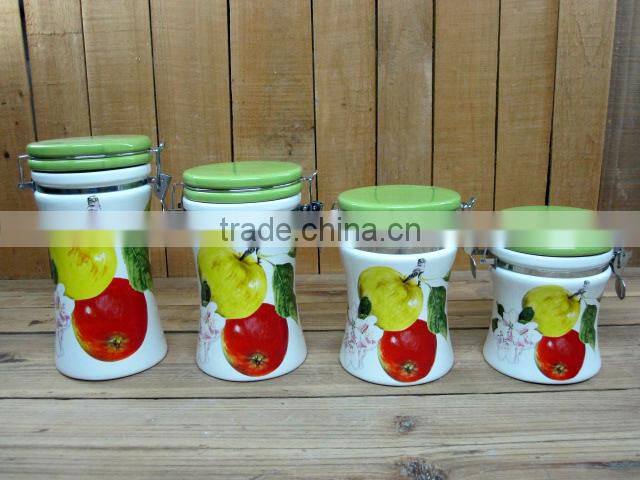 Home used ceramic storage jars with lemon decal