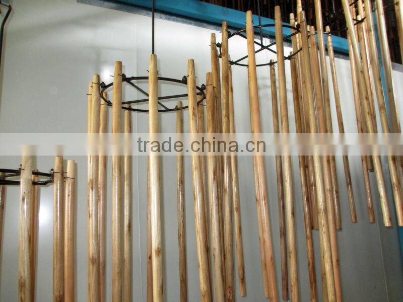 Varnished wooden mop stick