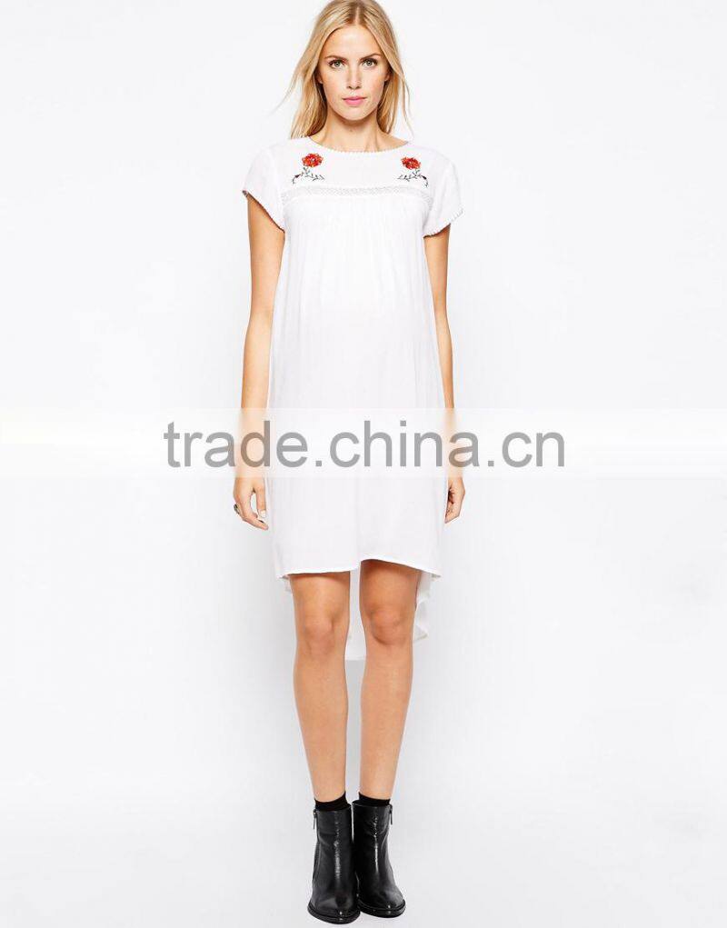 Maternity Embroidered Swing Dress With Dipped Hem China supplier
