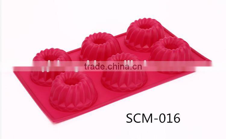 Hot sale food grade FDA and LFGB 9 hole shell shape colorful silicone oven cake mold
