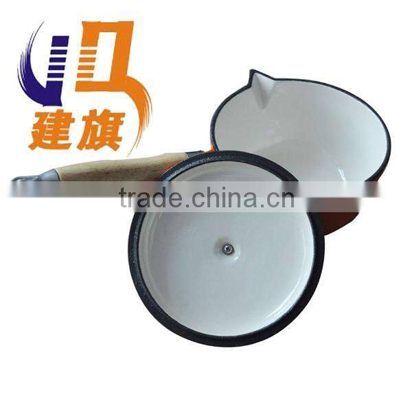 milk pot with wooden handle