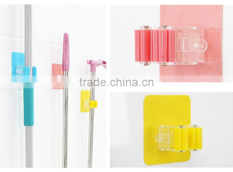 Wholesale Stock Magic Wall Suction Plastic Mop Handle Storage Holder