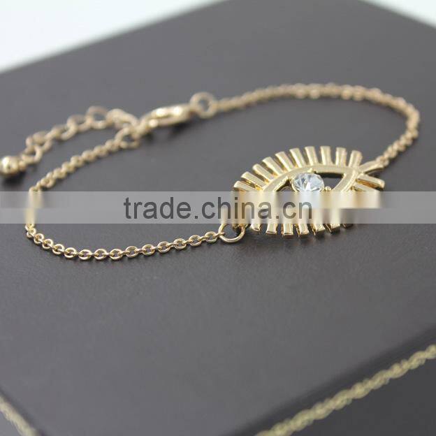 simple rhinestone evil eye charm gold chain bracelet