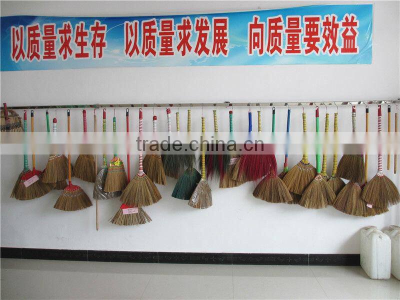 grass broom with short wooden handle