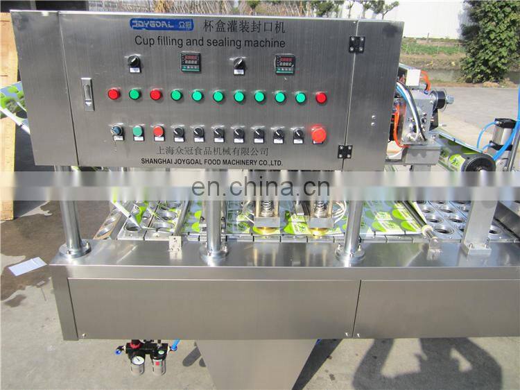 Automatic plastic cup sealing lid machine