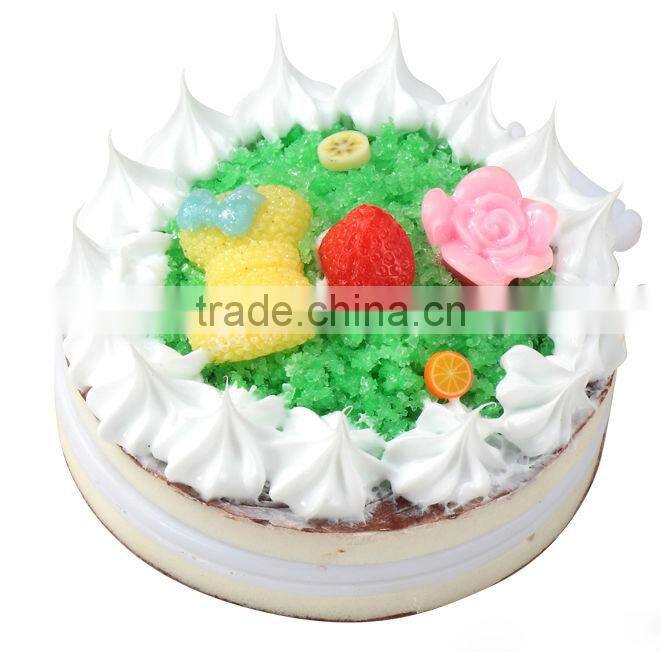Artificial wedding/anniversary/birthday cake with fake fruits decoration
