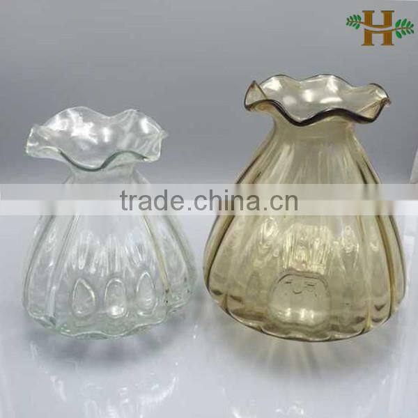 waved cone glass vase with flower shaped opening