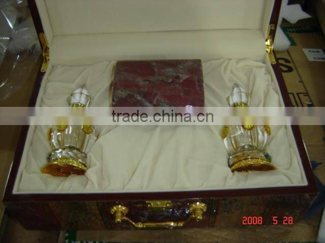 green color crystal decorative perfume bottle with golden flower