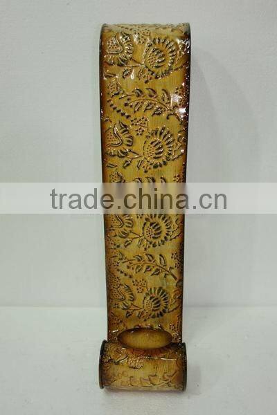 Wall- mounted iron candle holder