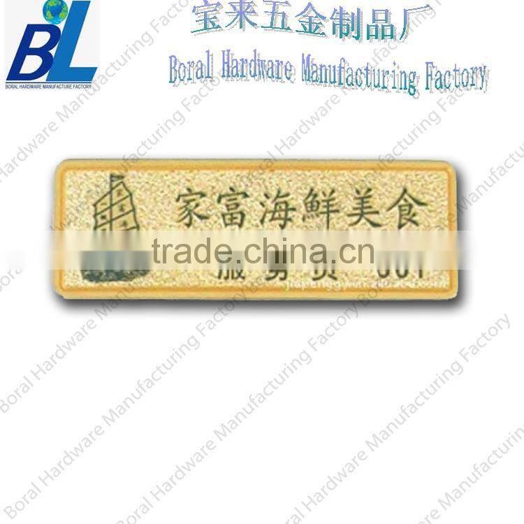Printed screw hold metal plate for brand logo
