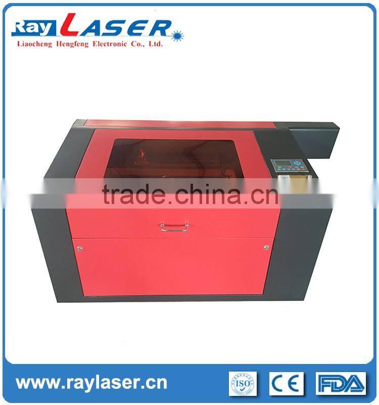 manufacturing professional low cost plastic best service co2 laser engraving cutting machine price