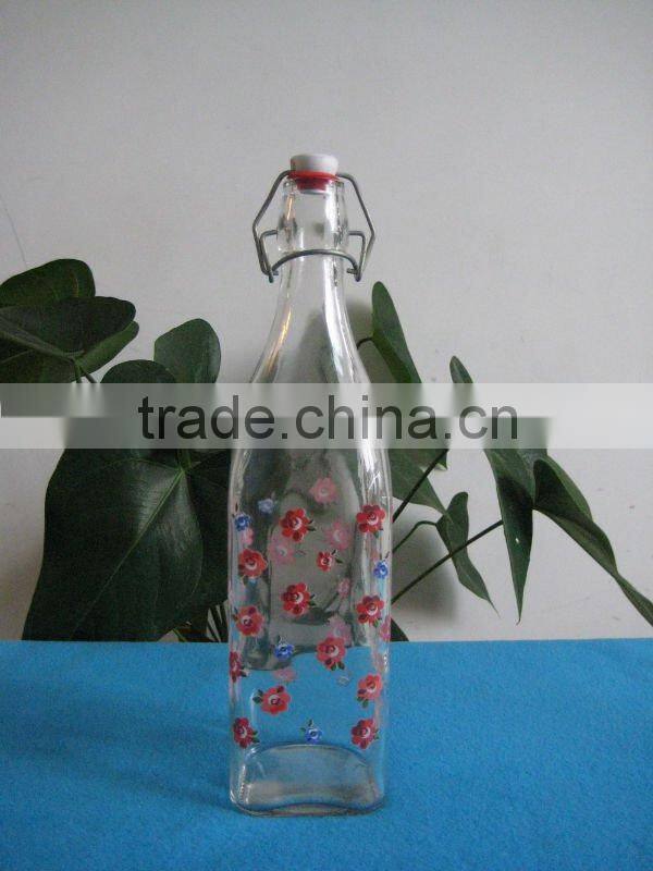 glass bottle with metal clip and plastic lid