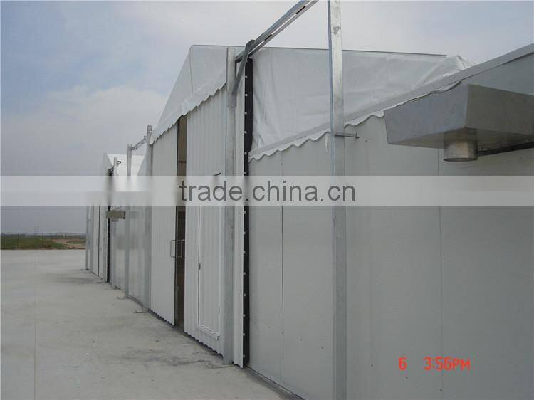 Waterproof architecture tent with rolling door