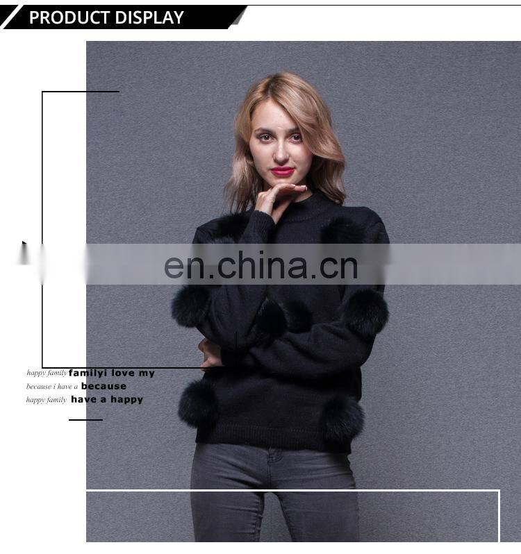 Woman black custom pullover sweater with a lot fox fur ball
