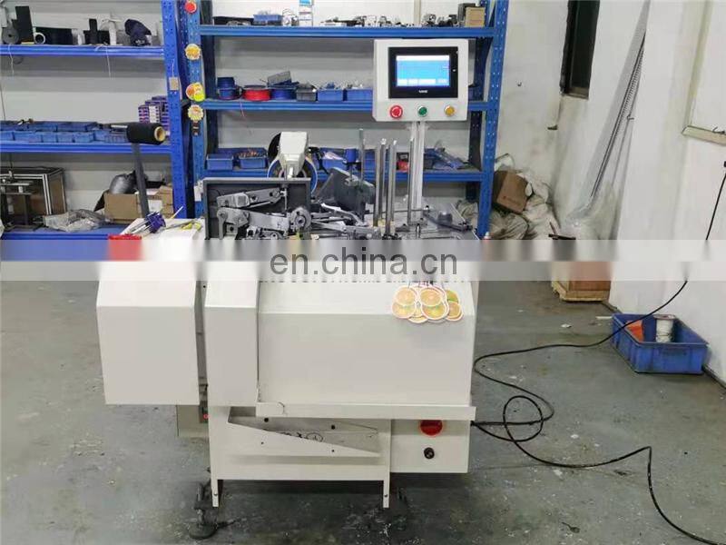 UT150 Fully Automatic Perfume bottle Hangtag Knot Tying Machine, car freshener card stringing equipment