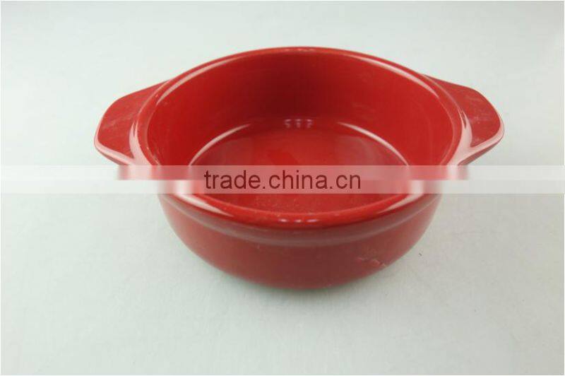 Stocklot red glaze ceramic round bakeware with handles
