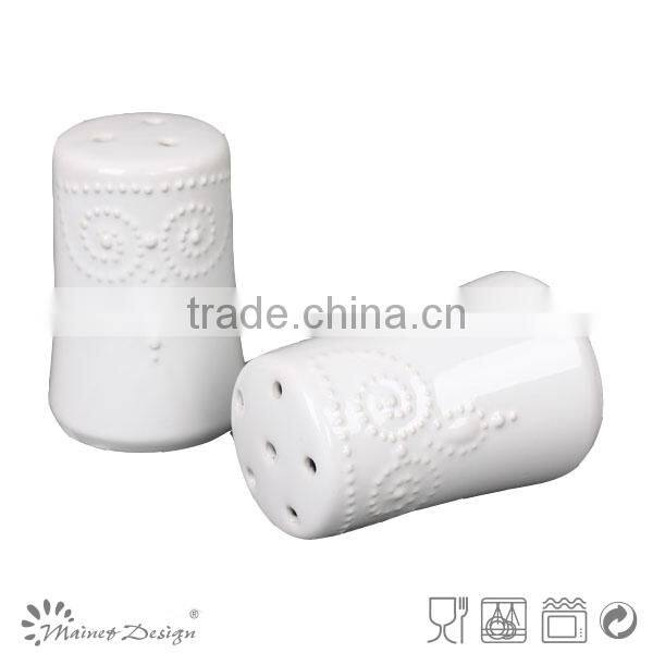 ceramic salt and pepper jars embossed round white