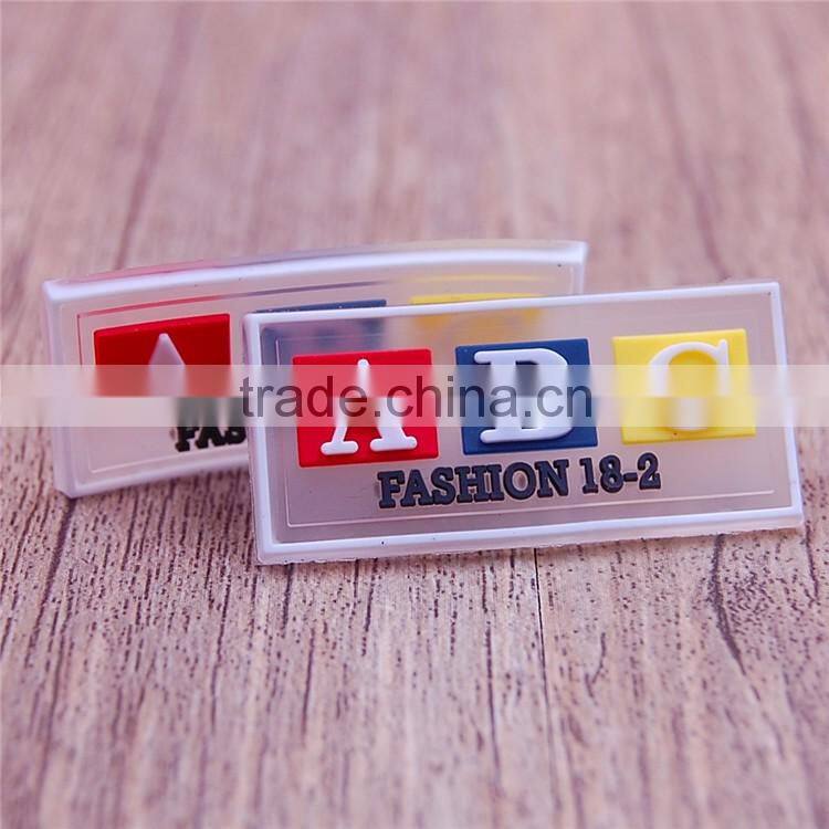 Custom wholesale red pvc labels tags for shirt clothing garment