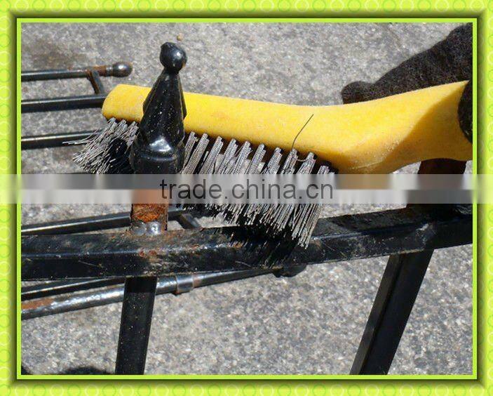 black wire brush with plastic handle