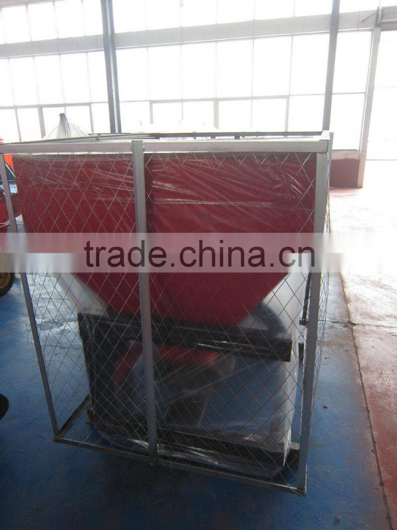 Agricultural tractor mounted broadcast sower