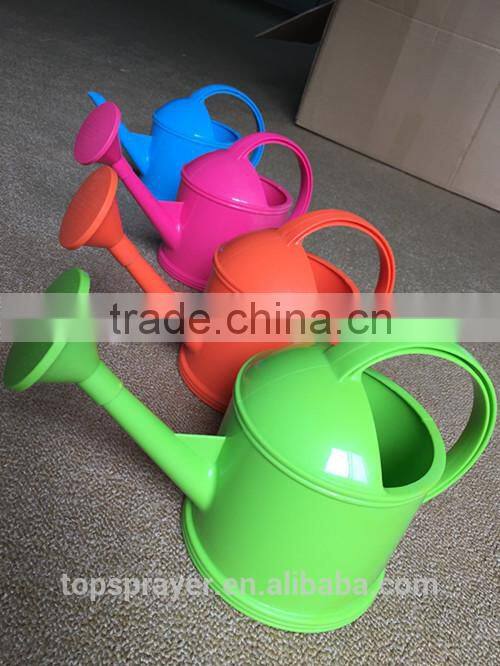 yellow green blue beautiful mini watering can