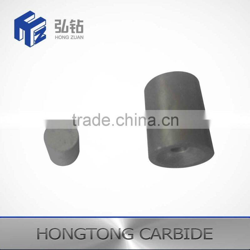 Tungsten carbide blast nozzles for the spraying and fine spraying of powders and liquids