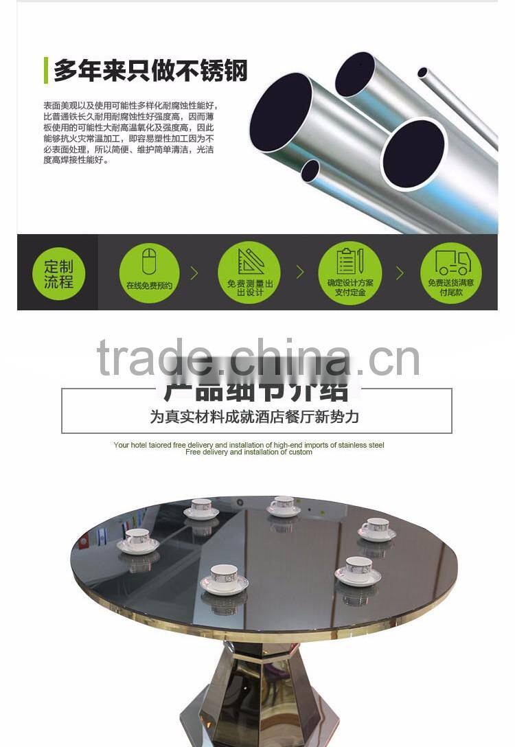 Upholstered stainless steel goldedn glass surface table for sale