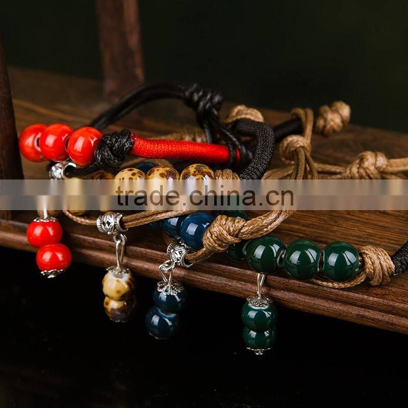 Retro Chinese Red Handmade leather Ceramic bead bracelet with bell on it