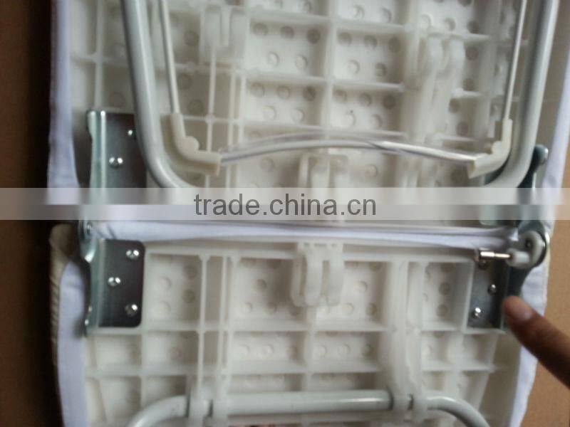 folding ironing board and ironing tabel in cupboard