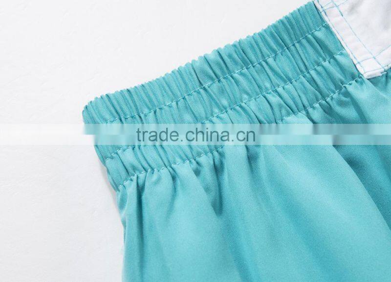 OEM Customized shaped boy swim shorts peach skin 100% polyester