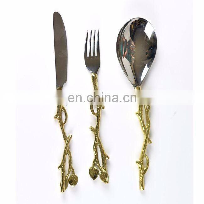 gold plated shiny antique cutlery