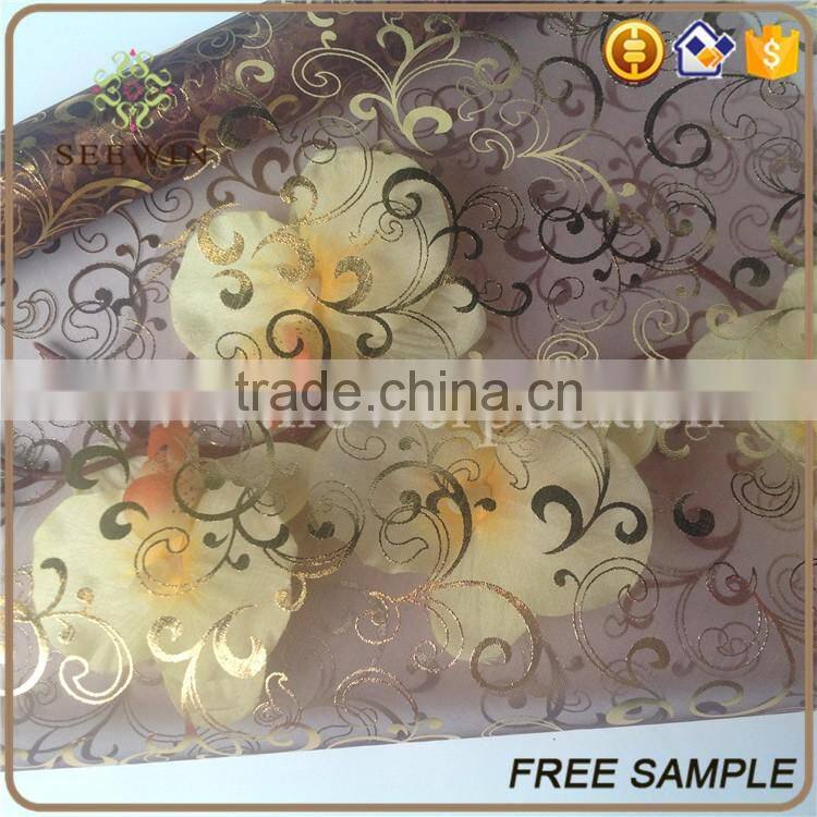 gilding rolls of organza fabric