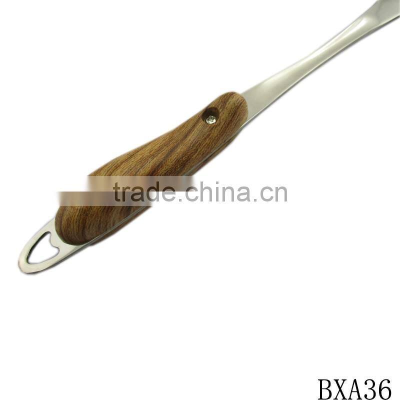Professional stainless steel cooking spatula with wood handle