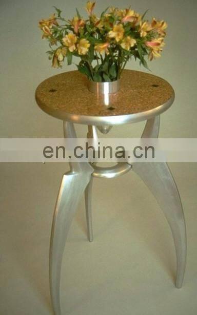 hamerred shiny polished metal stool