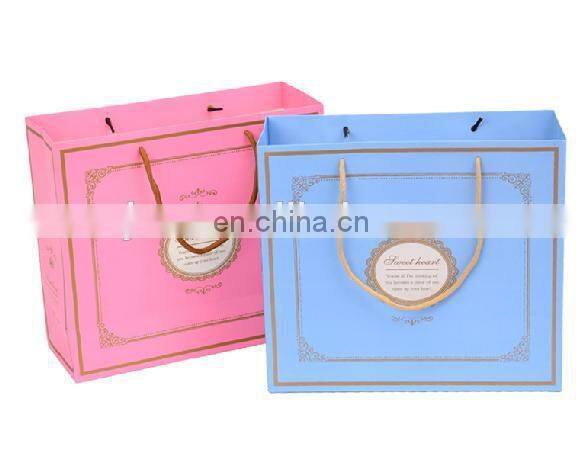 2015 fashion pink good quality luxury paper clothing bag supplier