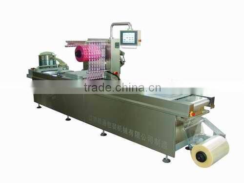 Snack automatic thermoforming vacuum packing machine