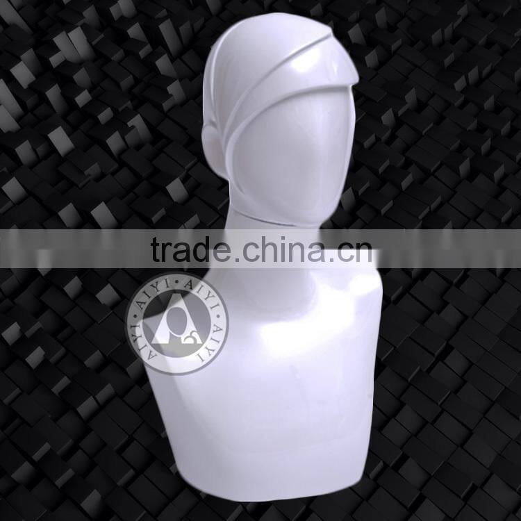 White glossy female mannequin bust without head