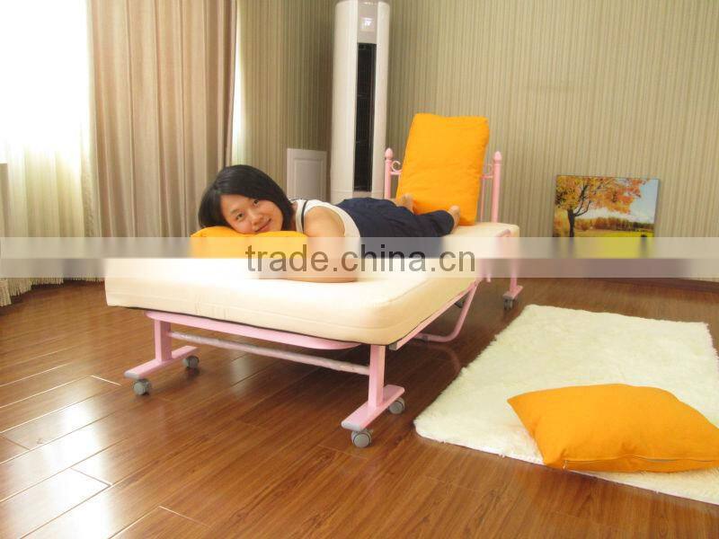 single pink folding metal bed