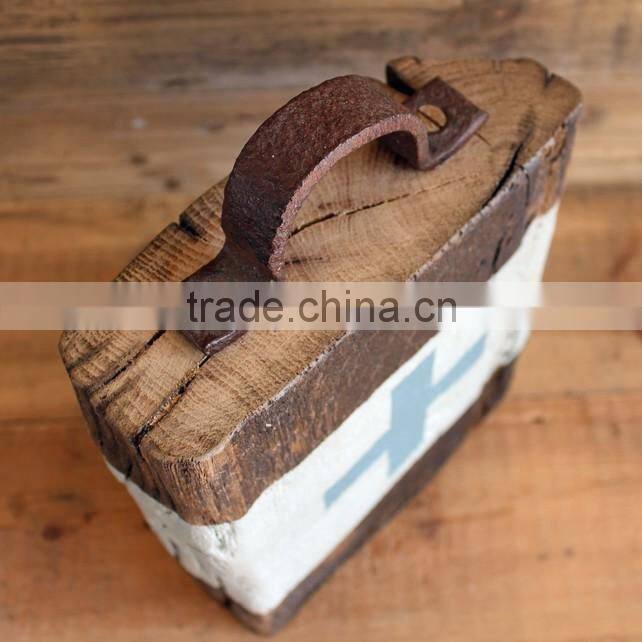 older aged wooden door stop