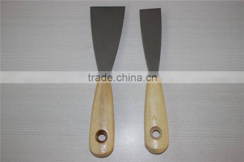 High carbon steel putty knife / construction tool