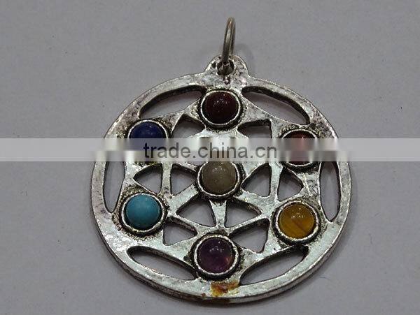 Narmada Shiva Linga with Black Stone Base : Wholesale Gemstone Narmada Shiva Linga