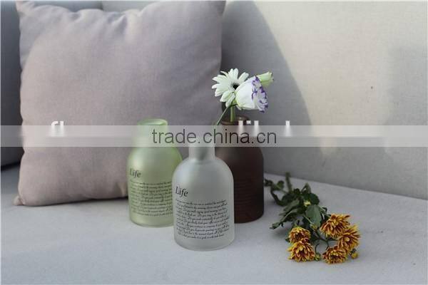 Lovely small round colored glass flower vase for living room