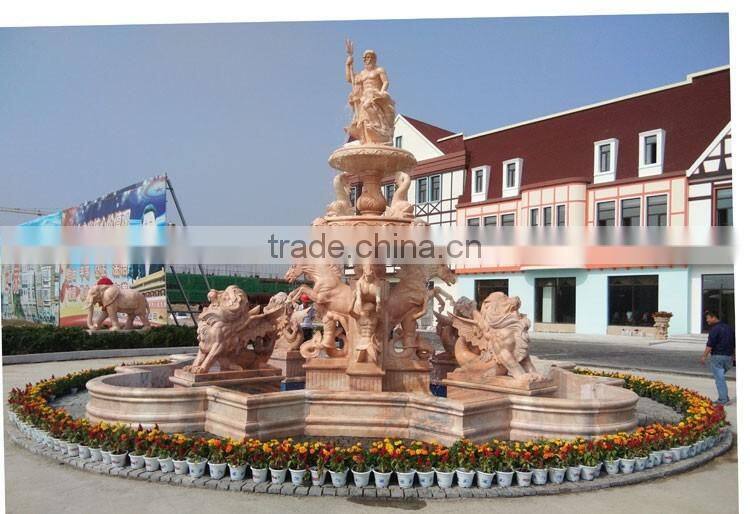 Large pink marble water fountain with poseidon and horses