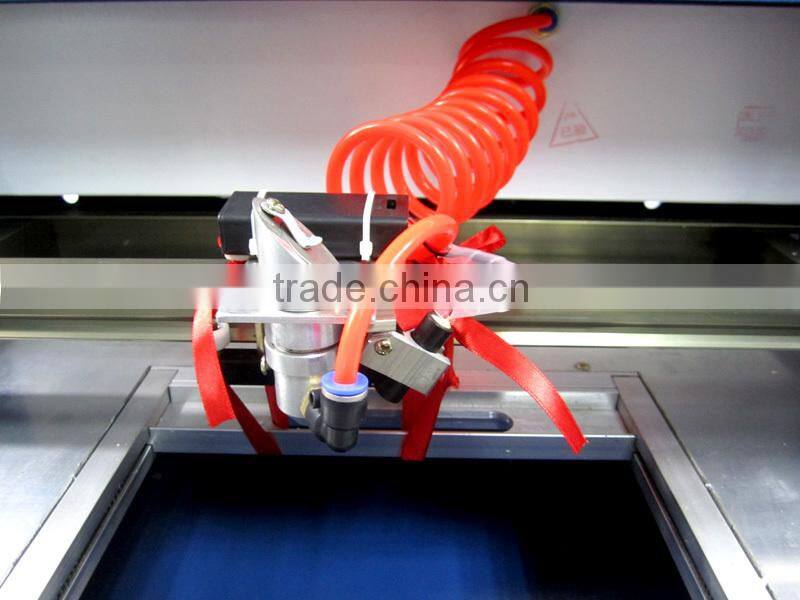Best rotary axis LY 3040 CO2 laser cutting machine price with 50W tube ,1 year Warranty laser engraving machine for sale