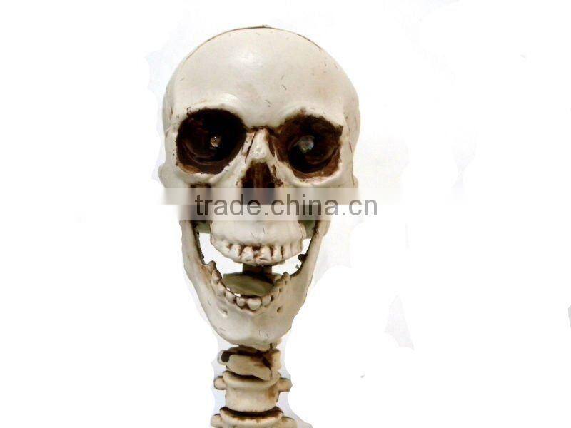 The scary halloween skull decoration with flash LED light