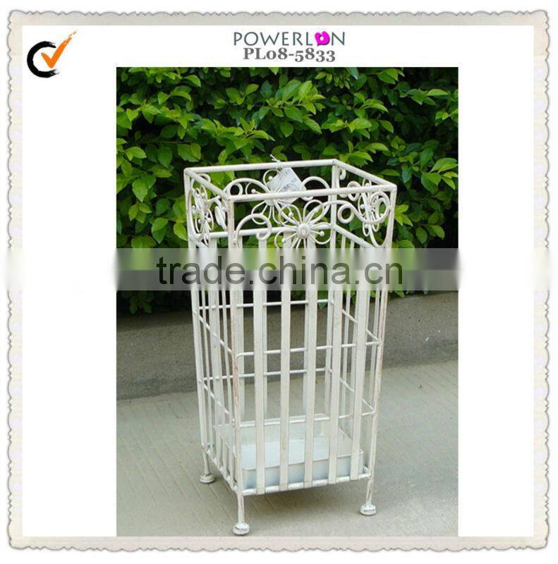 White metal indoor umbrella holder