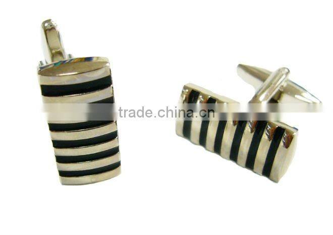 Metal Cufflink with diamonds design