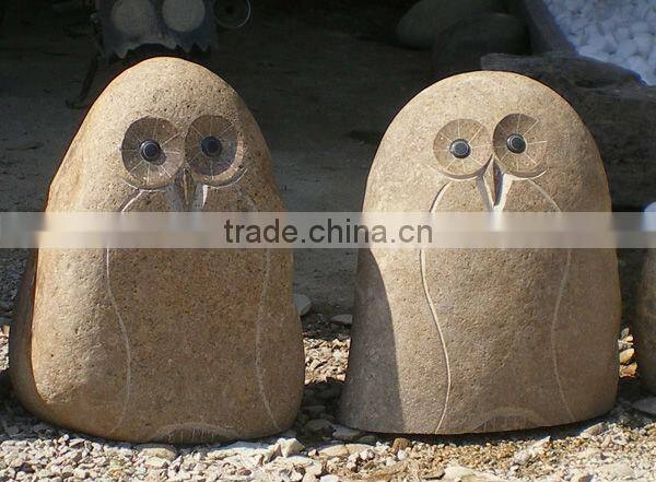 Carved Stone Owls, river stone owls