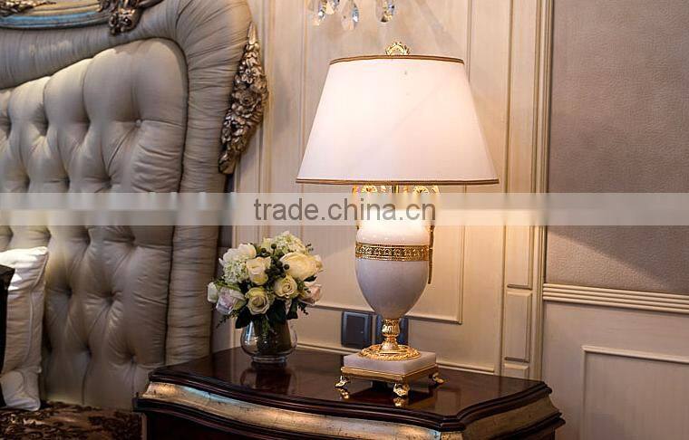 Graceful white color jade body brass bottom home use table lamp with fabric lampshade