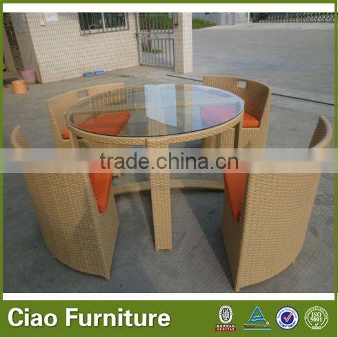 round clear glass on top rattan table set